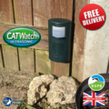 The CATWatch Ultrasonic cat deterrent hung from a garden fence, about 8 - 10 inches from the ground